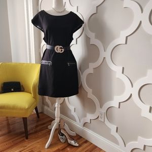 Black dress with faux leather trimming